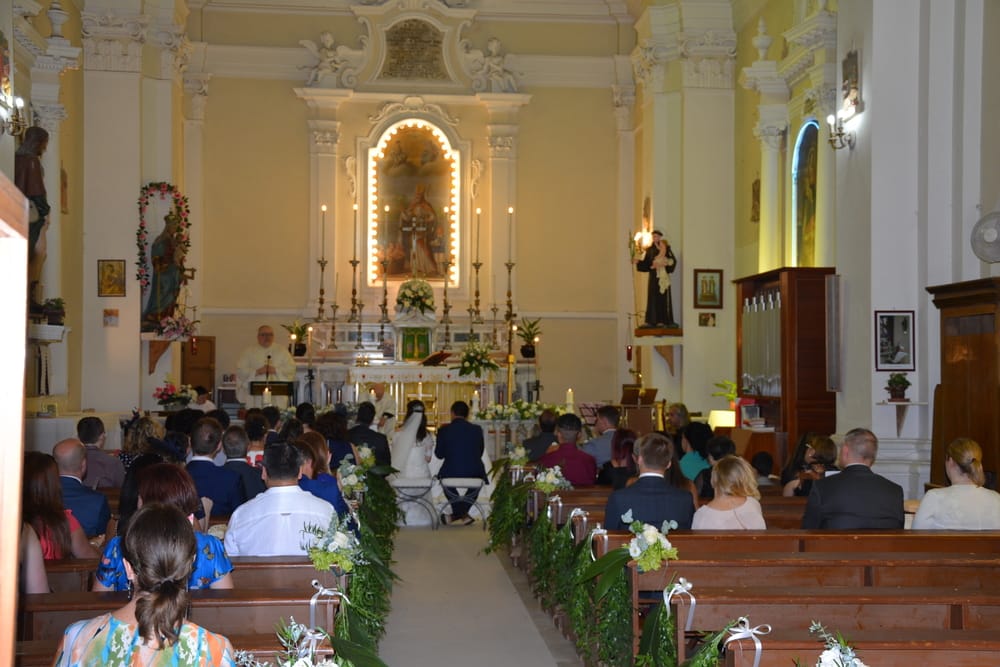 Gemma and Giancarlo marrying in a church in Italy